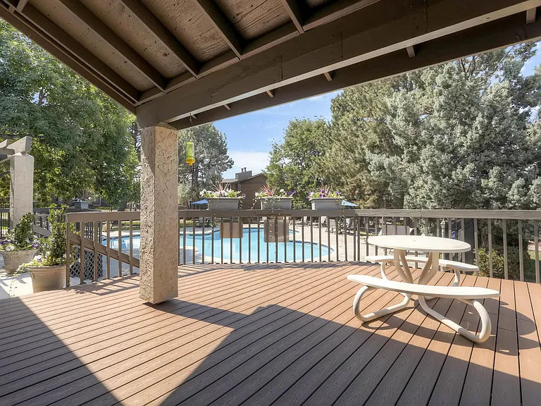 The Community Outdoor Deck and Swimming Pool at Greentree Village Apartments