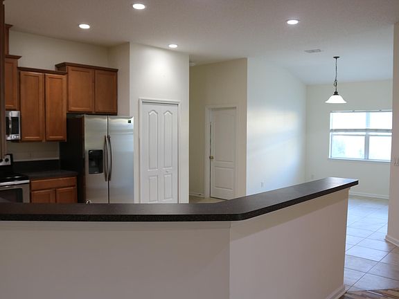 Large eat-in kitchen and separate laundry room