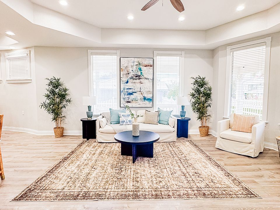Open living room in larger, downstairs apartment