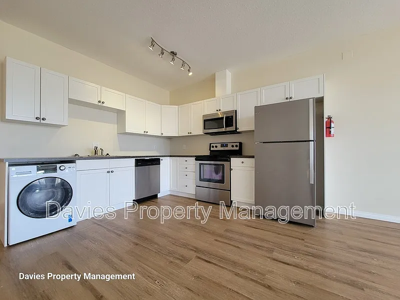 Building Photo - 4834 49th Ave #2