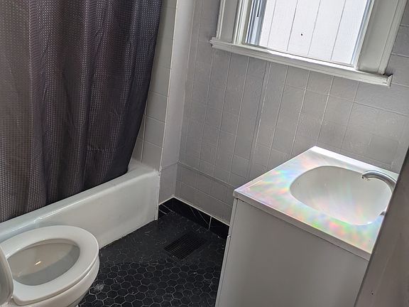 One small bathroom off the kitchen