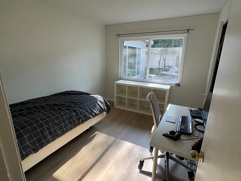 Room 1 - This room now has personal AC unit and curtains. House also has central AC and Heat
