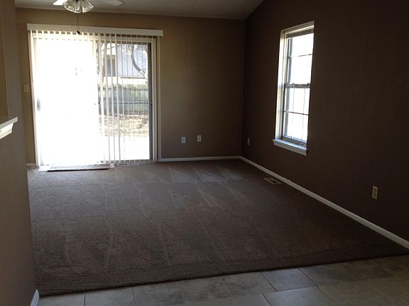 Living room showing sliding glass doors to patio