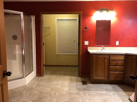 Master bath facing closet 