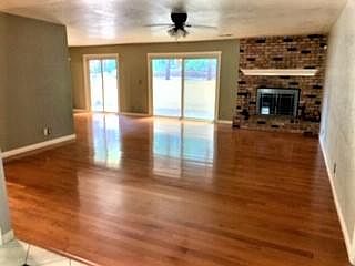 Living Room (from Foyer/entrance). Dining Room extends from back left