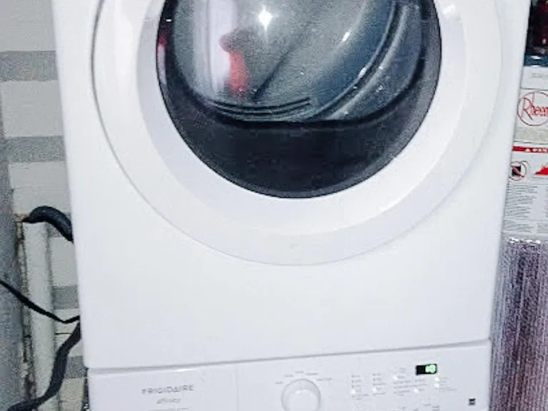 Laundry area (shared, accessible through unit.)