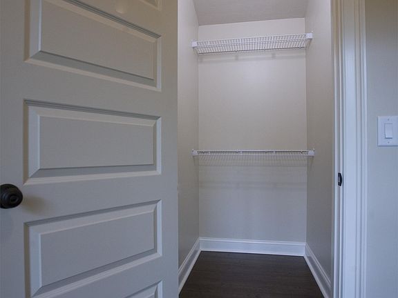 Walk in closet in hall