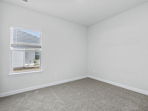 Spacious secondary bedrooms offer plenty of room for the whole family and overnight guests.