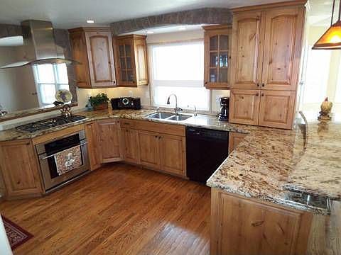 Knotty Alder Cabinetry and Slabe Granite