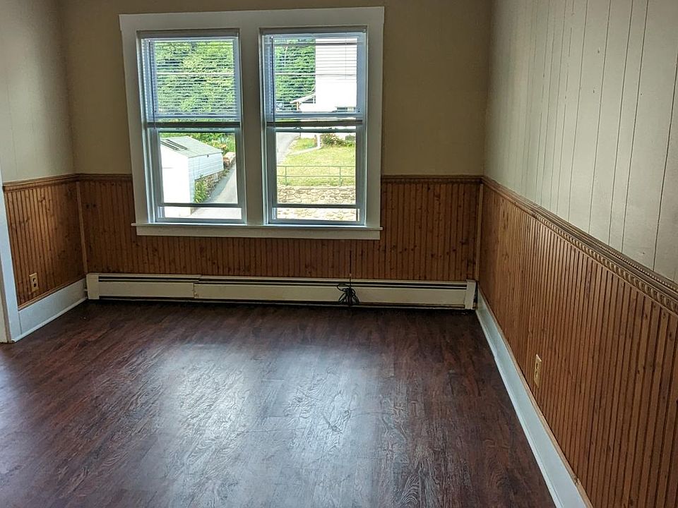 Living Room with beautiful wainscoting wood accent