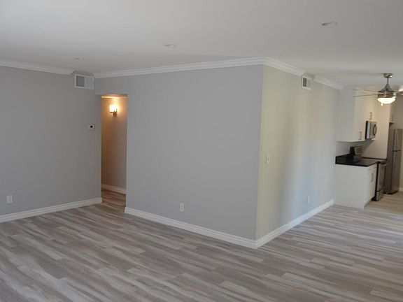 Living Room with dining area and kitchen