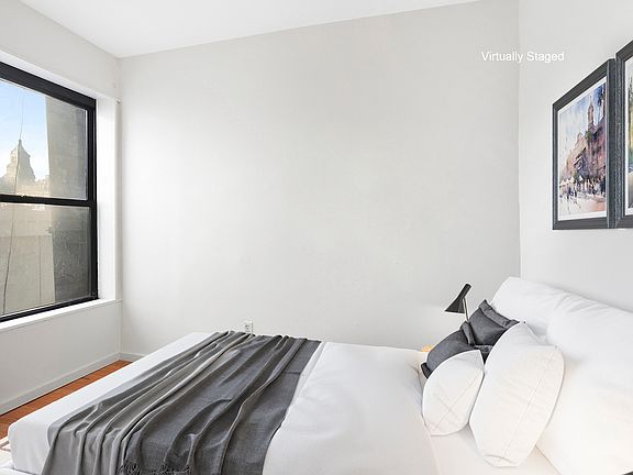 5th image of 242 E 10th St APT 26