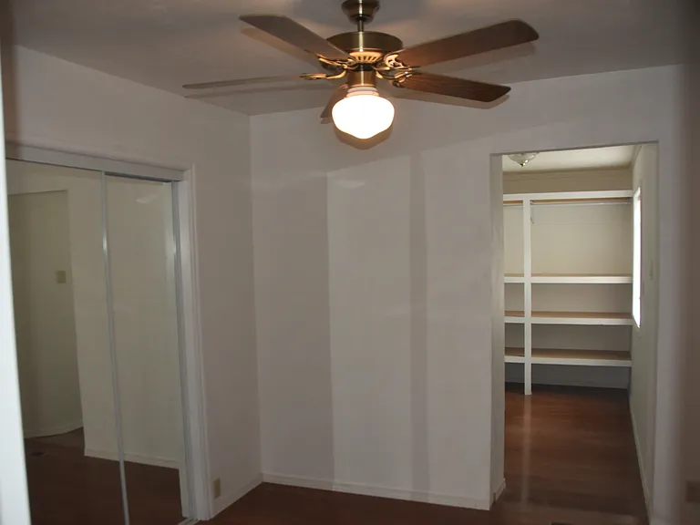 Bedroom with Closet and then walk in Closet with room for Desk.