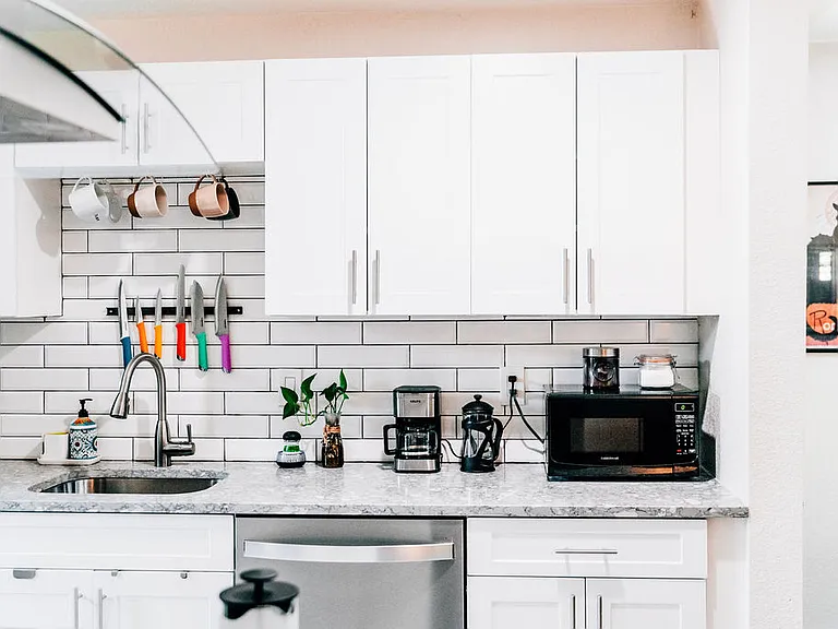 Fully stocked and clean kitchen.
