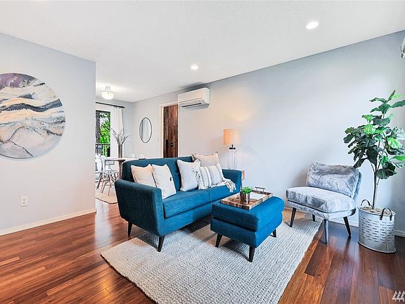 Enter in front door to light and bright living room.