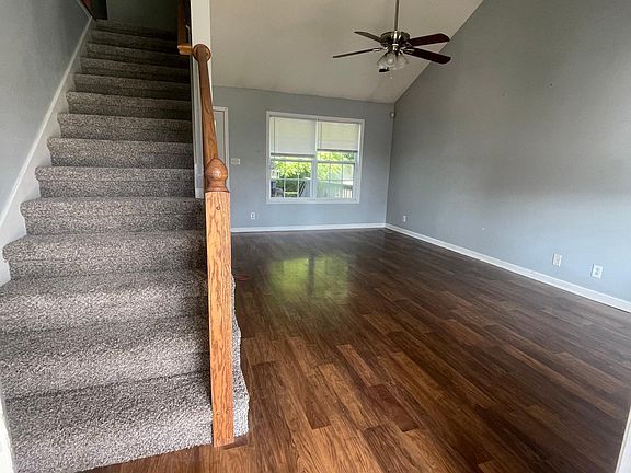 Front Entrance to living room and front stairway.