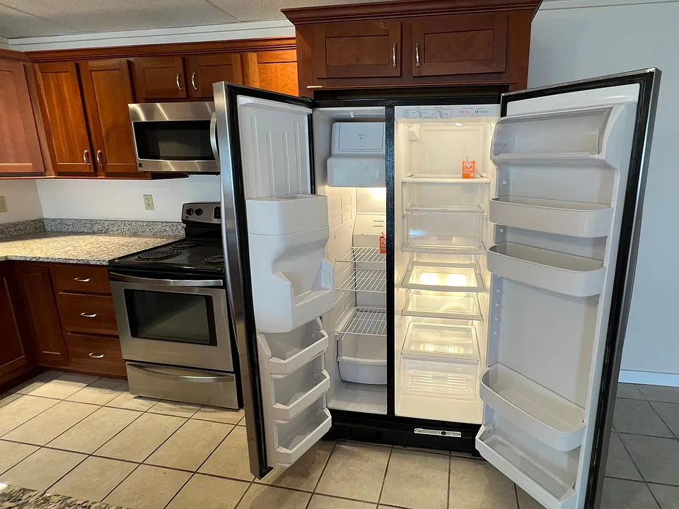 Side-by-side refrigerator with ice-maker and water dispenser