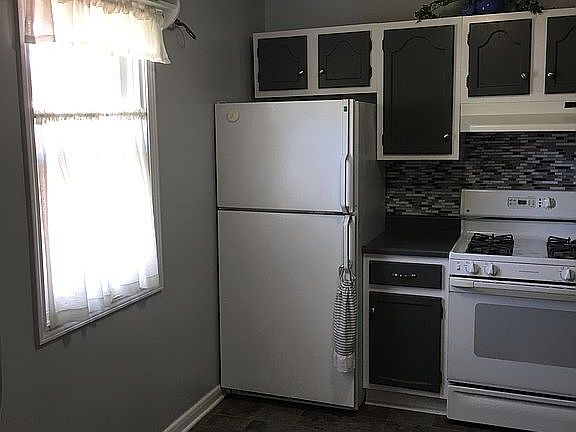 Kitchen before new fridge