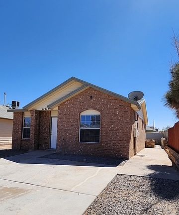 FRONT AND SIDE OF HOUSE
