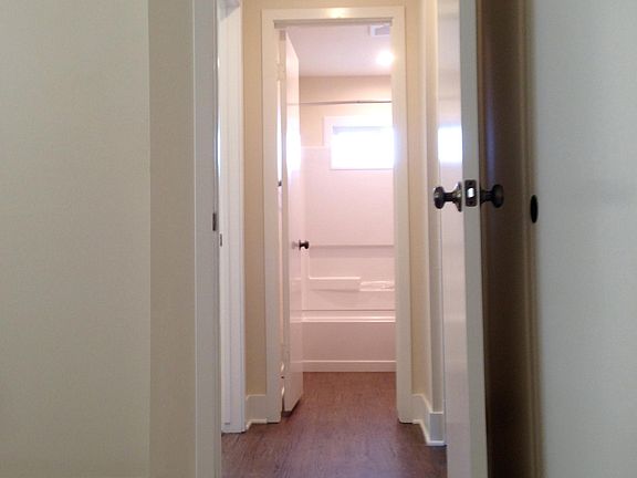 Light, bright interior shows off luxury vinyl floor + plush