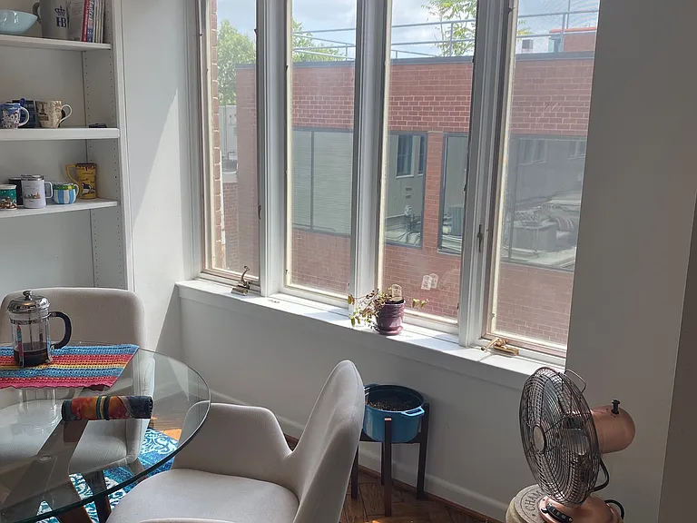 Dining Room view Facing EAST. Large Windows
