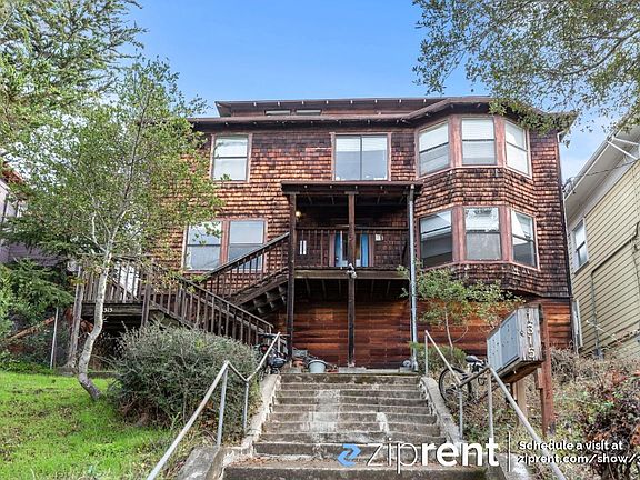 Cottage is located behind this main building.