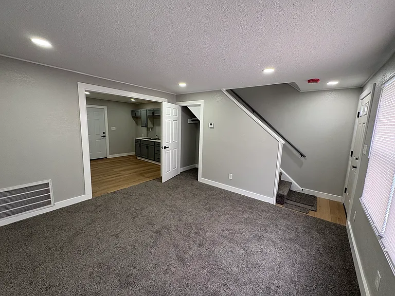 Living room & coat closet