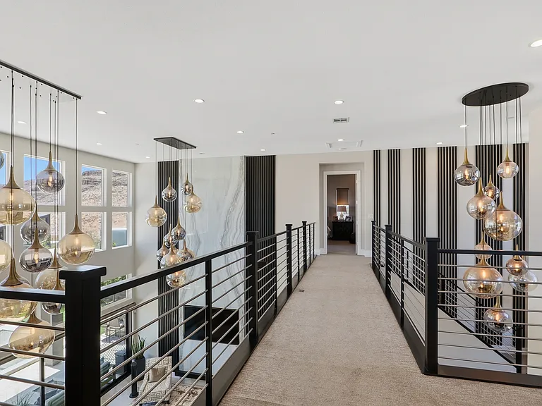 #GuardianRealty 10941 Earth Hues Summerlin Luxury Home Rental upstairs walkway_06232026