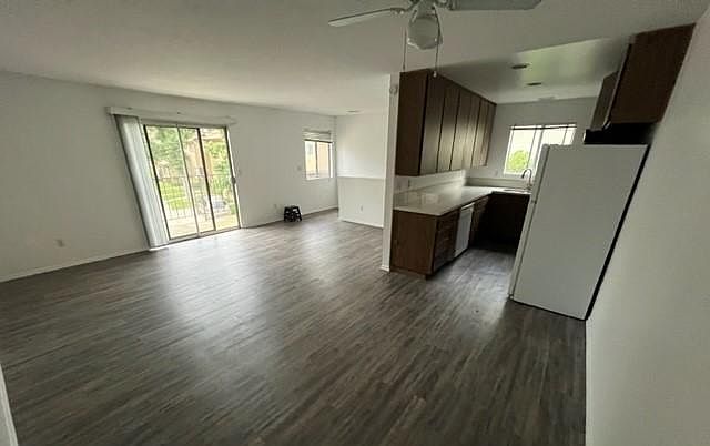 Living Room with balcony & Kitchen