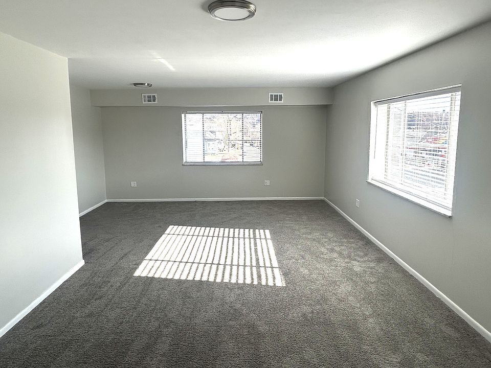 Entrance to apartment view of Living room. Fantastic natural lighting.