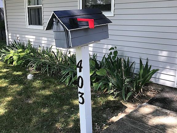 Cute mailbox matches house