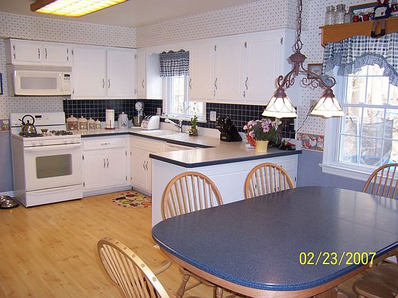 Updated Kitchen with Corian type Countertops