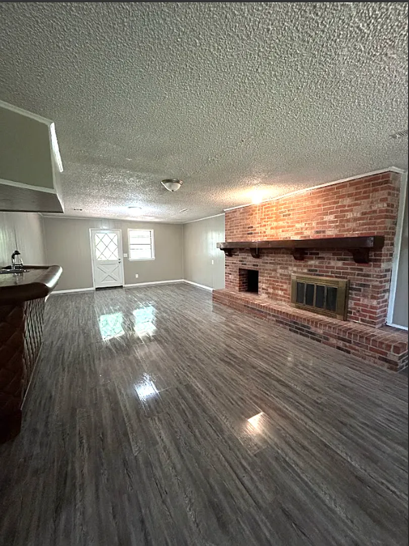 Spacious 5-Bedroom Home with Modern Updates and a Cozy Fireplace — Photo 3