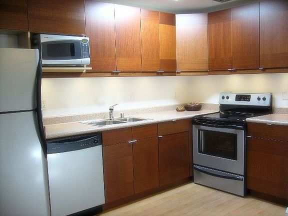 Brand new, modern kitchen with steel appliances!