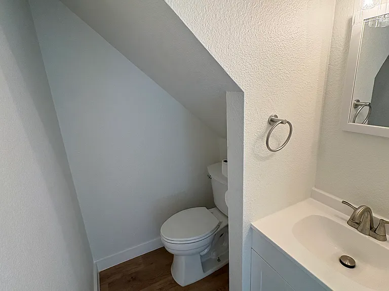 Downstairs 1/2 bathroom. New vanity, new toilet.