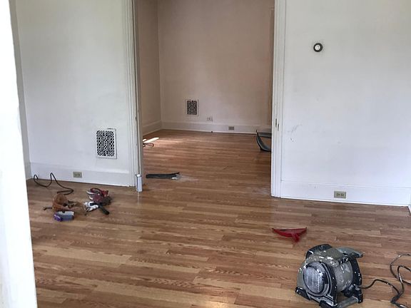 Living room view into dining room