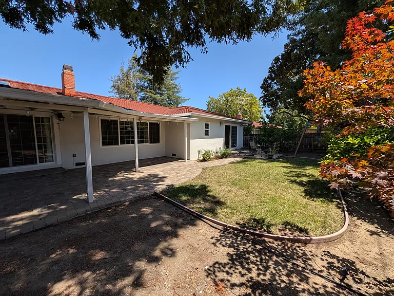 Back yard facing living room and master bedroom.