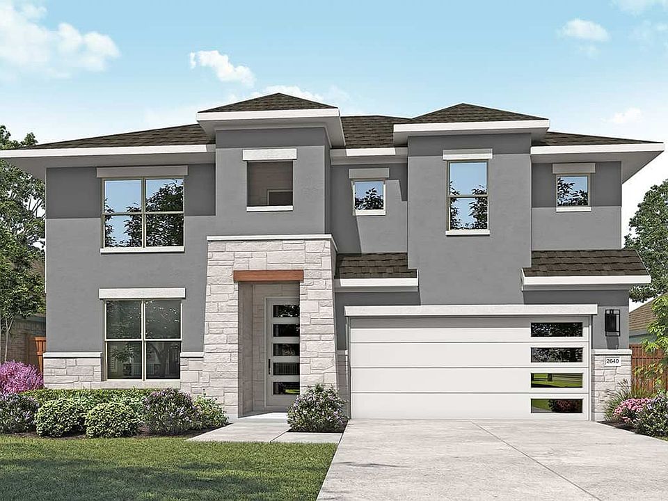 Elegant facade with sleek stonework and expansive windows in San Gabriel s prestigious enclave.