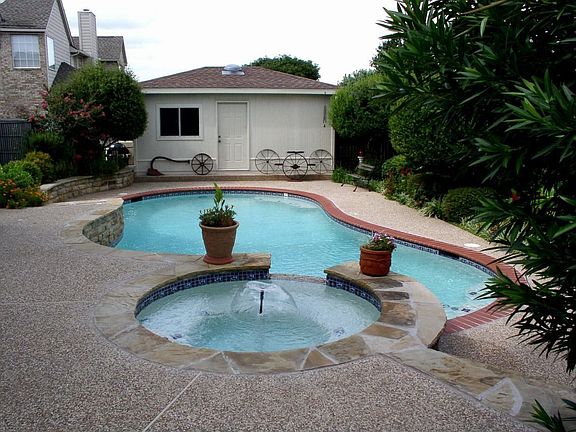 Pool, spa, waterfall, bldg