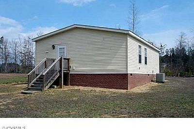 Back of home showing side entrance to the mud room.