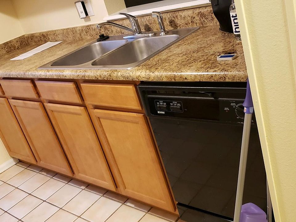 Kitchen with sink and dishwasher