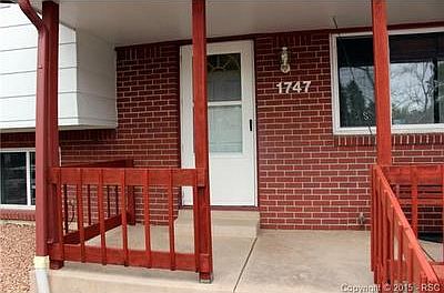 Covered front porch greets your guests!