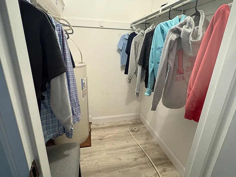 Walk in closet in bedroom. Three additional closets in unit for ample storage space.