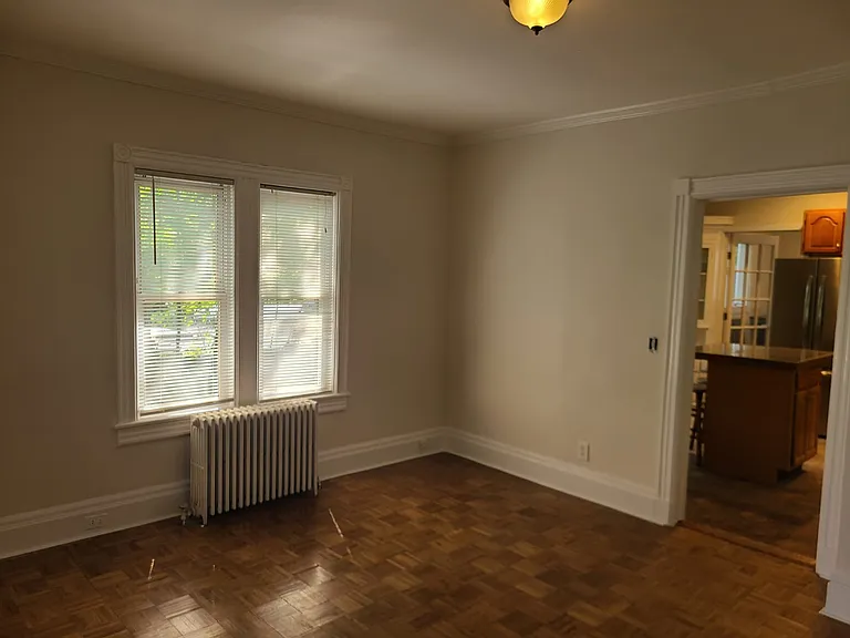 Living room with hot water radiator warmed with natural gas.