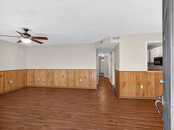 Dining room has a cut through to the kitchen and great floors.