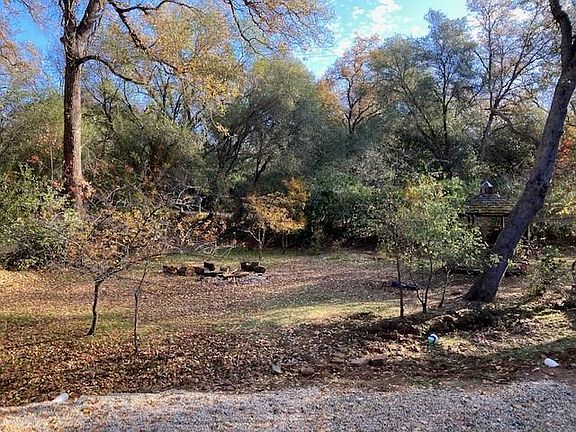 view from flagstone patio, seasonal creek in foreground