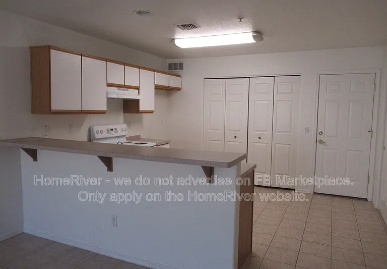 2406 Kiowa Blvd N #103 — Photo 3