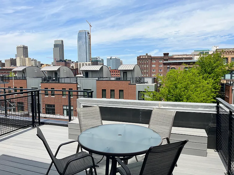 Rooftop deck. Patio furniture included.