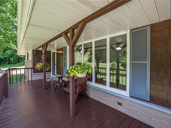Sit back and relax on this adorable front porch