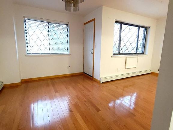 Living room #1 with access to the balcony.